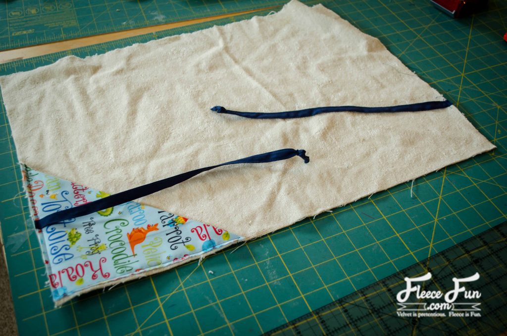 adding the ties. I love this sewing project for babies. This diaper changing mat is simple to make and the perfect addition to any diaper bag or purse! fleece fun waterproof change mat tutorial