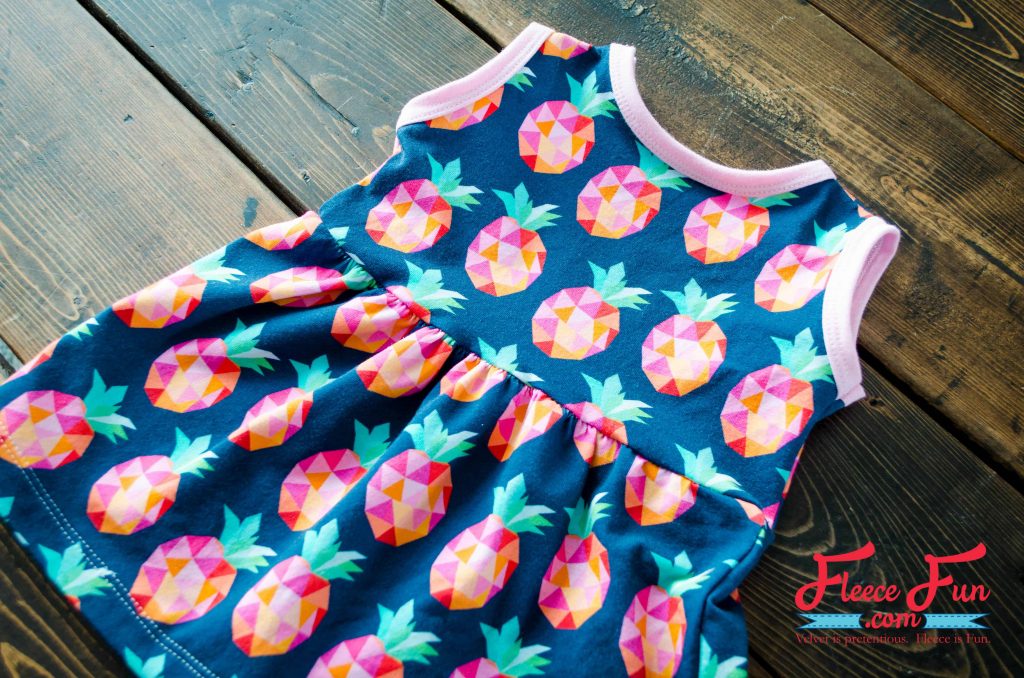 Close-up of a handmade baby sundress using fleecefun free template and tutorial