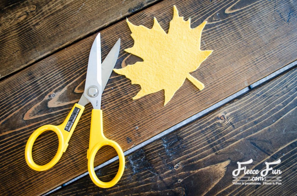Using the template provided, cut 3 leaves out of each color.