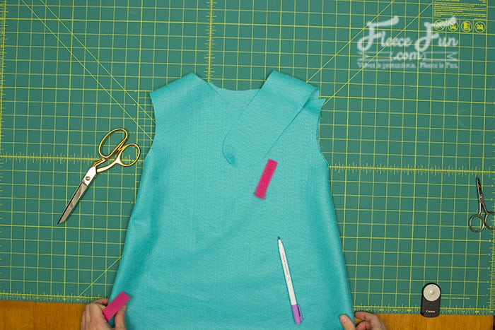 Take your Velcro and using a making pen mark.