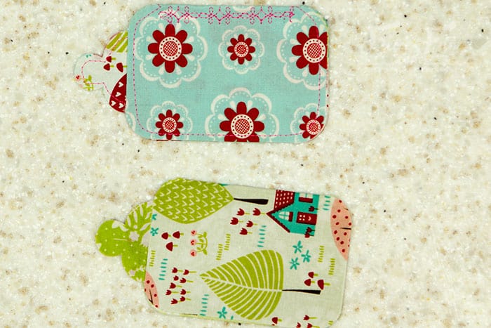 Assembling the pieces of a luggage tag DIY featuring fleecefun and free template and tutorial