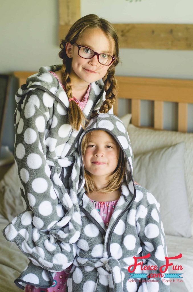 Kids wearing a comfy fleece robe sewn with fleecefun free template and tutorial
