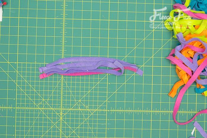 Fleece unicorn hat with a vibrant mane, easy-to-follow instructions