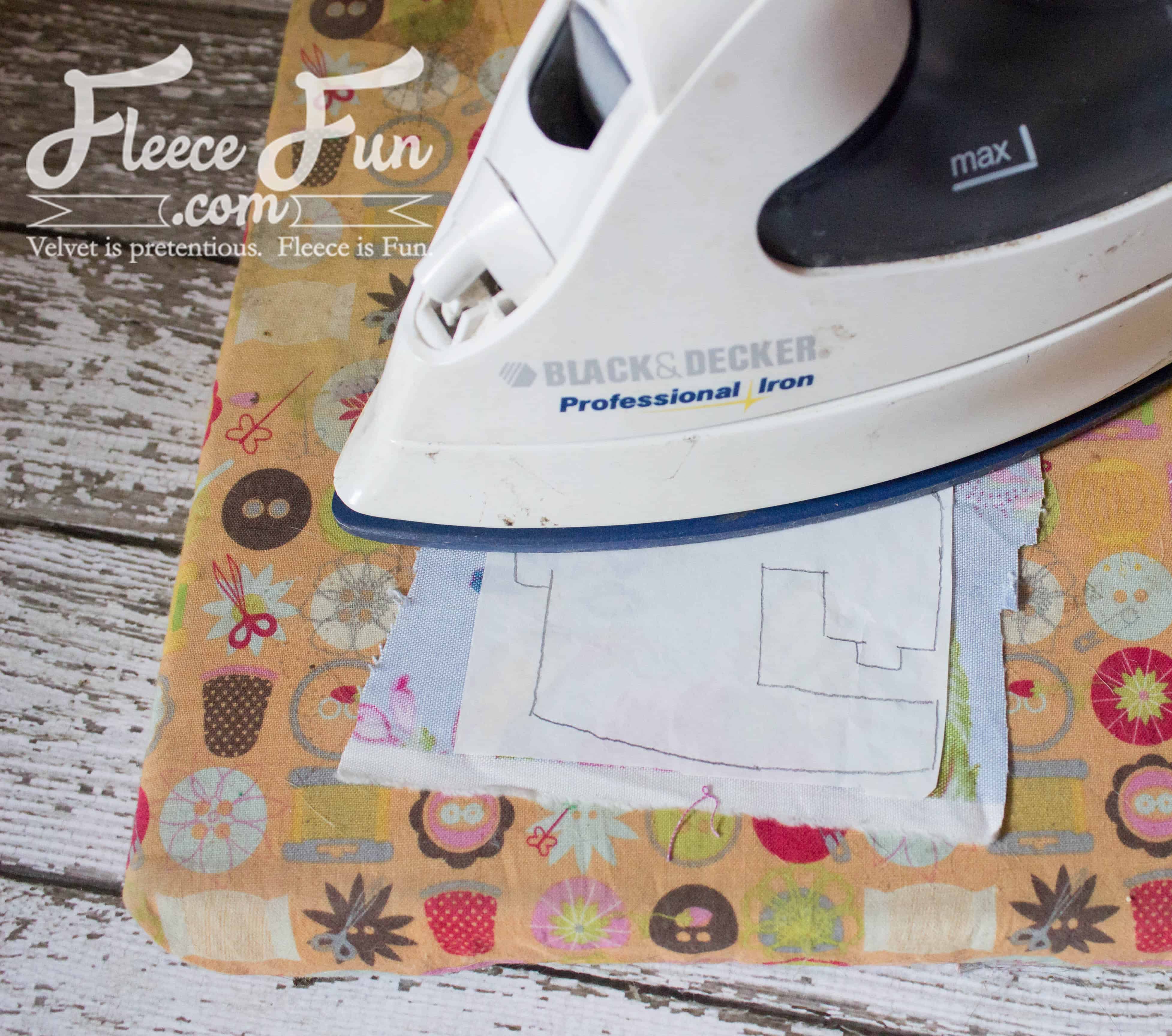 ironing the traced pieces. I love this Sewing Machine Hoop Art Tutorial. wonderful sewing project and handmade gift ideas for friends. This is perfect for a sewist's wall and sewing studio.