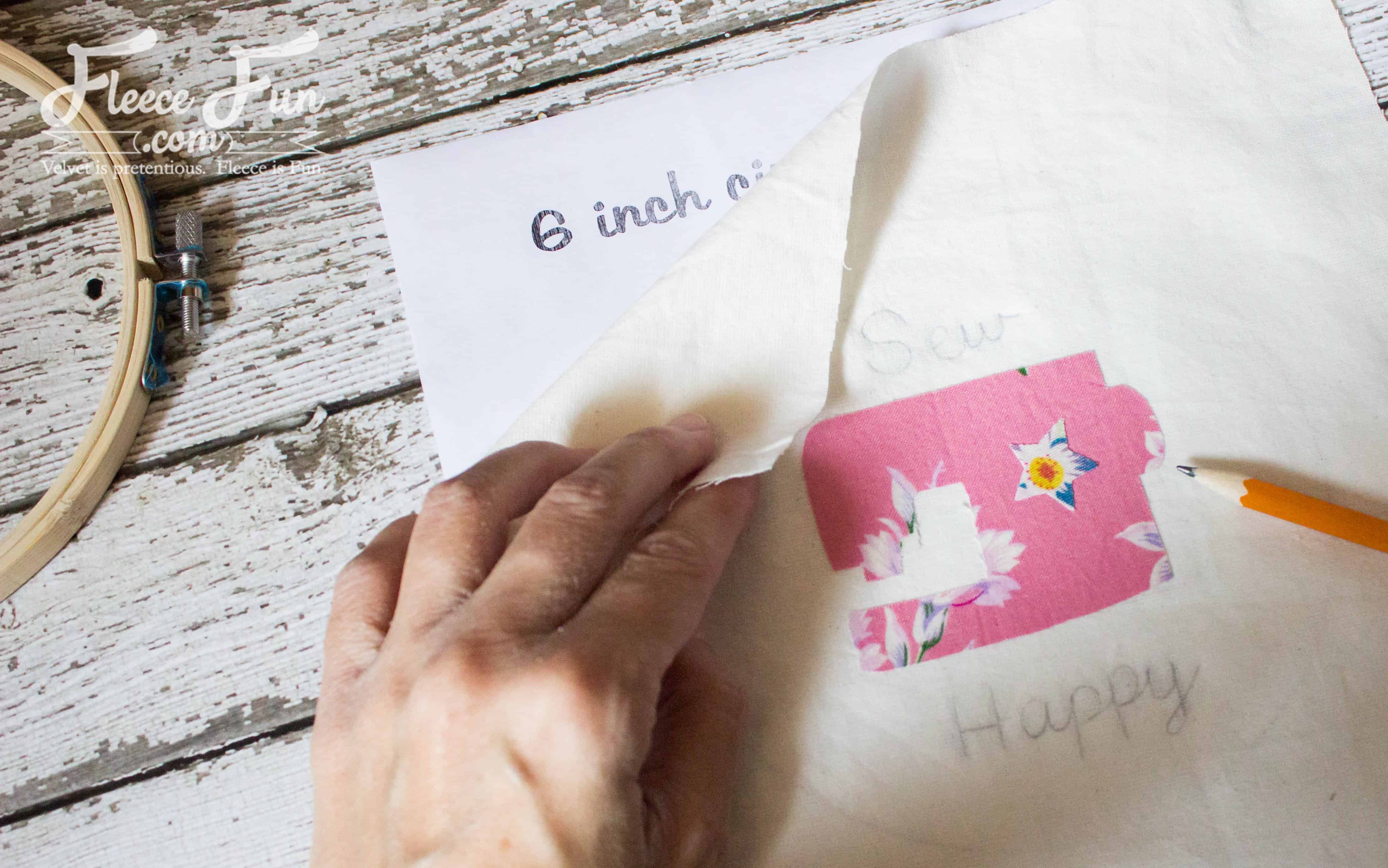 adding wordage. I love this Sewing Machine Hoop Art Tutorial. wonderful sewing project and handmade gift ideas for friends. This is perfect for a sewist's wall and sewing studio.