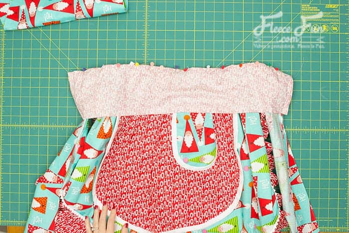 Final steps to sew the vintage apron together using fleecefun’s free pattern.