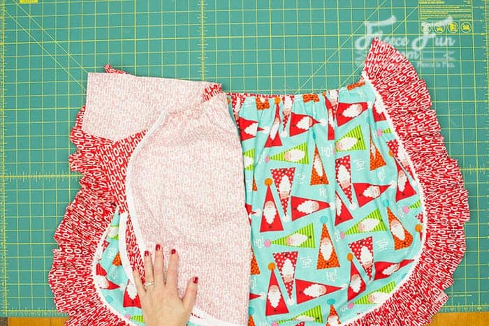 Completing the vintage apron sewing process with fleecefun’s free template and tutorial.