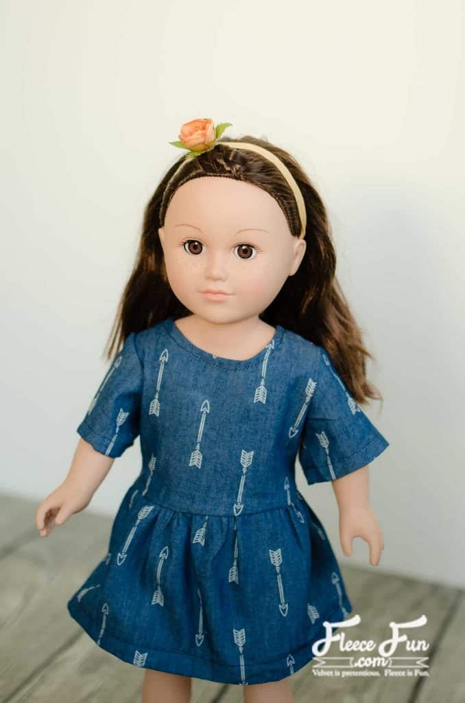 This free pattern shows you how to sew a sweet chambray party dress for your 18″ doll. It’s the kind of dress that works for any occasion—casual with boots and a cardigan, fancy with a bolero and shiny shoes. With clear steps and simple sewing, you’ll have dolly dressed to impress before the party starts.