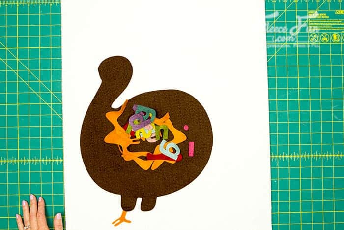 Step 3: Glue the turkey elements into place using FleeceFun's free template and tutorial.