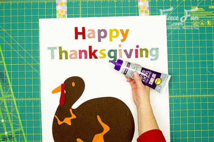 Free template and tutorial by FleeceFun: Glue the turkey elements into place for the game.