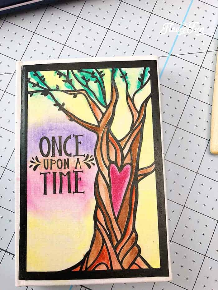 painting the notebook. finished notebook cover. You can learn how to decorate a notebook with this easy to follow step by step tutorial with lots of pictures and clear instructions. Make a cute keepsake or handmade gift with this DIY.