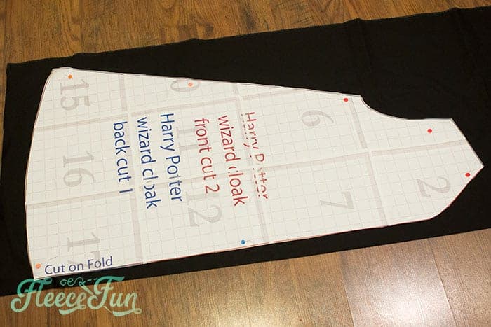 Place pattern on folded fabric and cut 2 . Easy Hogwarts robe pattern and tutorial from fleecefun