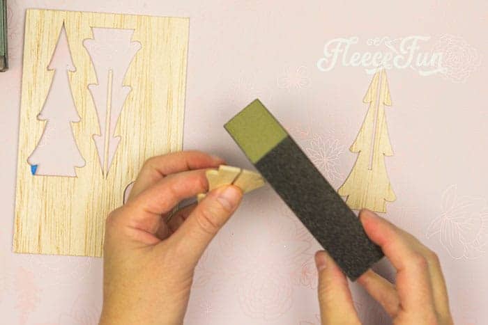 Step-by-step process for making decorative trees for a holiday terrarium using fleecefun's guide.