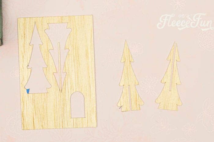 Handmade festive trees for a Christmas terrarium crafted with fleecefun's free template and tutorial.
