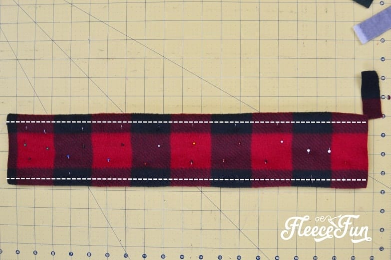 Turn the sewn tube right side out for your fleece ear warmer headband DIY by fleecefun.