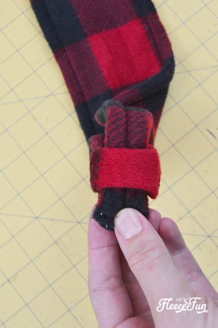Attaching the fleece ring to your DIY ear warmer headband with fleecefun's free template.