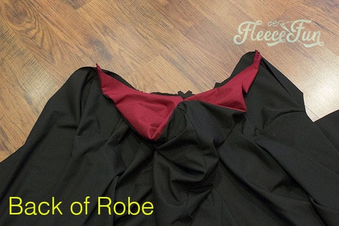 Pin the hood to the robe neck, right sides of the exterior touching. Sew to the robe. Set the robe aside.