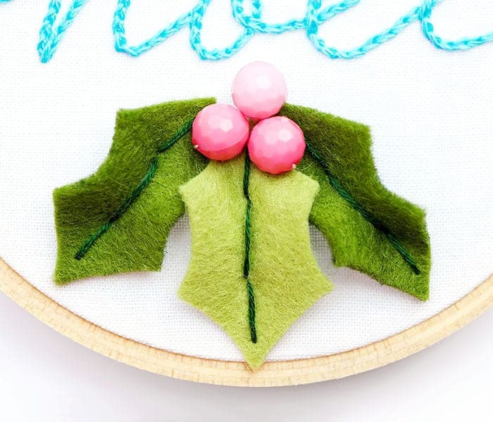 Assembling the Noël hoop ornament with fleecefun's free Christmas embroidery tutorial.