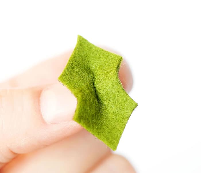 Holly leaf creation and stitching, as guided by fleecefun's Christmas embroidery designs.