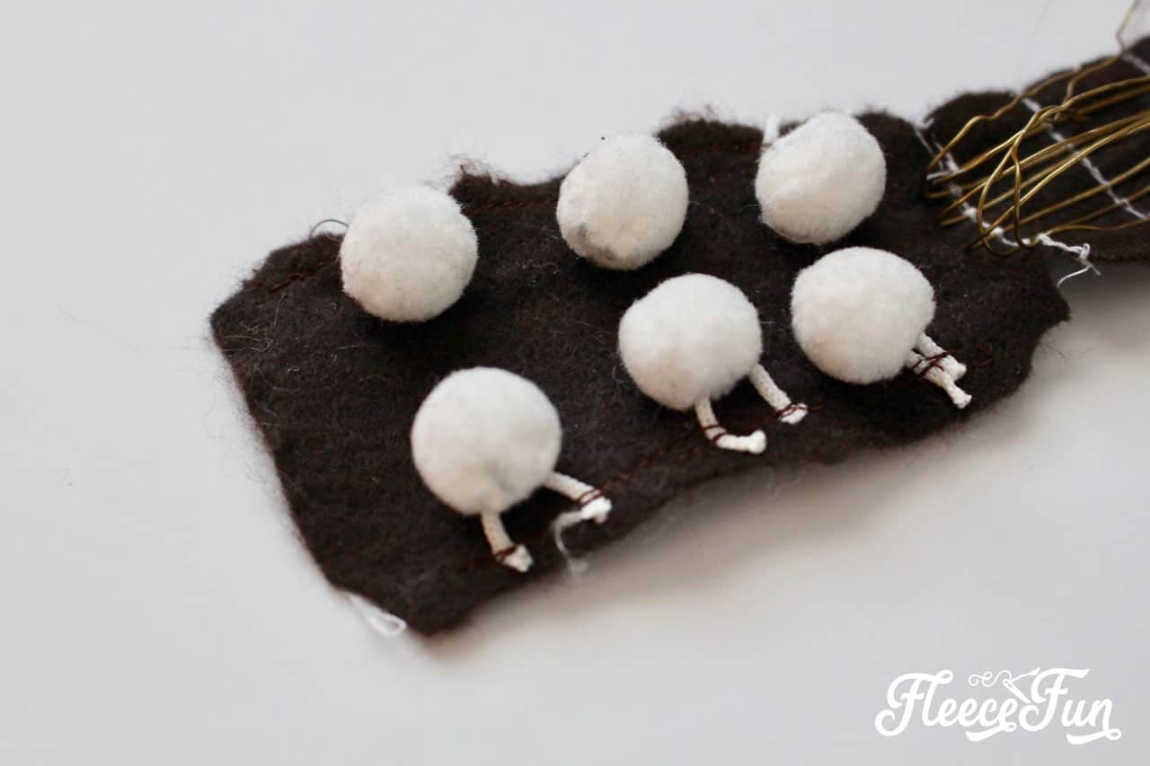 Adding Pom-Poms to the Felt Guitar Softie Toy Headstock