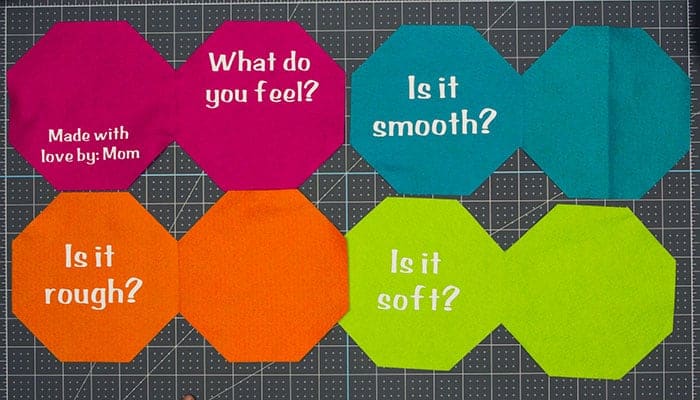 Prepping fabric edges and sensory elements for sewing a baby soft book with fleecefun free template and tutorial
