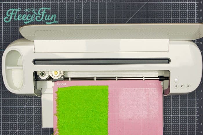 Using the free template to cut fabric for a handmade softie book baby toy from fleecefun