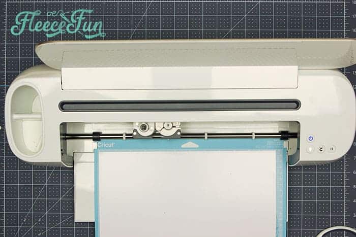 Cutting fabric pieces for the softie book baby toy with fleecefun free template and tutorial