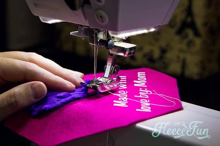 Sewing sensory elements onto the softie book pages with fleecefun free template and tutorial