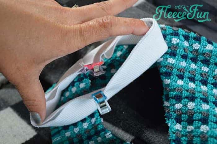 sewing the neckband on
