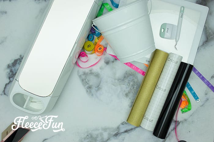assembling all the materials needed - Cute Trash Can DIY for your craft space. Make your craft room tidy and cute with this fun to craft trash can. Beautiful step by step photos make it easy.