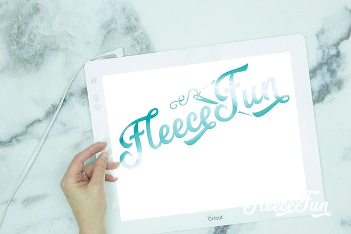 DIY felt flower artwork enhanced with HTV from fleecefun’s free tutorial