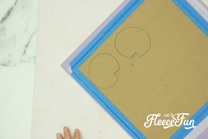 Step 1 progress photo showing cut pieces for a Disney-themed savings jar using fleecefun and free template and tutorial