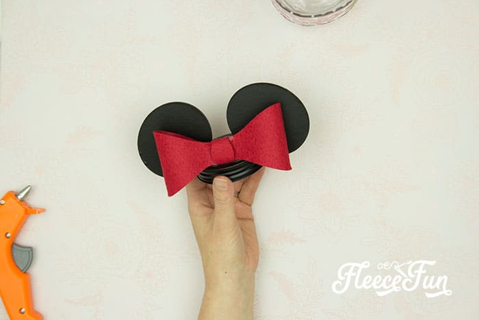 I love this Saving for Disney DIY Disney Savings Jar. Such a cute Mickey craft makes it fun for kids (and adults) to save for a Disney trip!. Easy craft that comes together quickly.