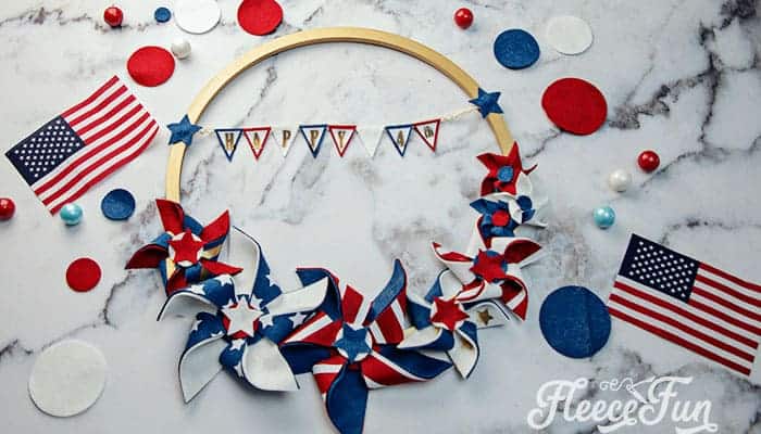 Make this Americana Decor DIY Patriotic Pinwheel Wreath. Download the FREE project file and follow the beautiful step by step photos and instructions.