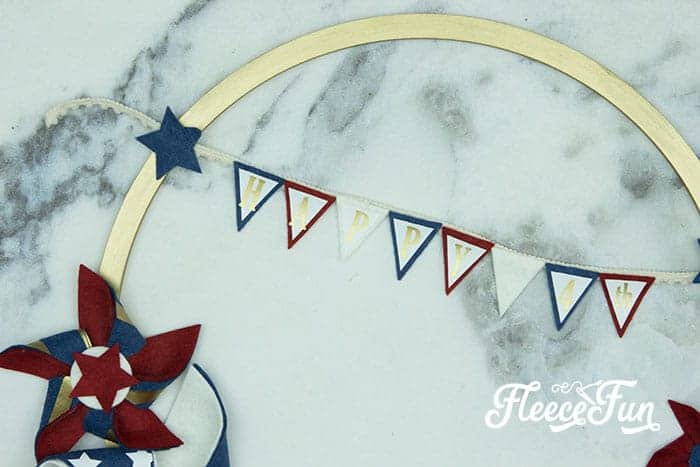 Glue the triangles along the ribbon.