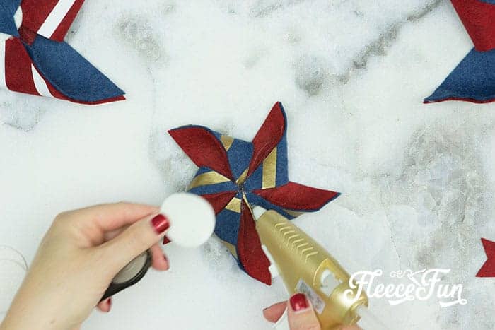 Glue a circle and a star to the center.