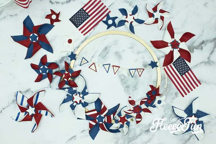 Make this Americana Decor DIY Patriotic Pinwheel Wreath. Download the FREE project file and follow the beautiful step by step photos and instructions.