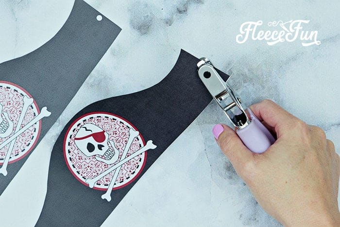 Punching the holes.