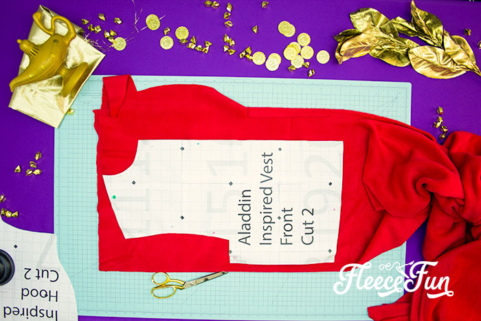 This Aladdin costume DIY is inspired by the Vest from the 2019 movie! Use this free pattern to make a hoodie vest just like Aladdin's.