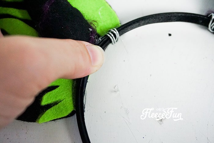 These Maleficent inspired Minnie Ears are perfect for chillin like a villain at your favorite Disney Park or a great idea for Mickey's Not So Scary Halloween Party. The free printable template makes it easy to put together.