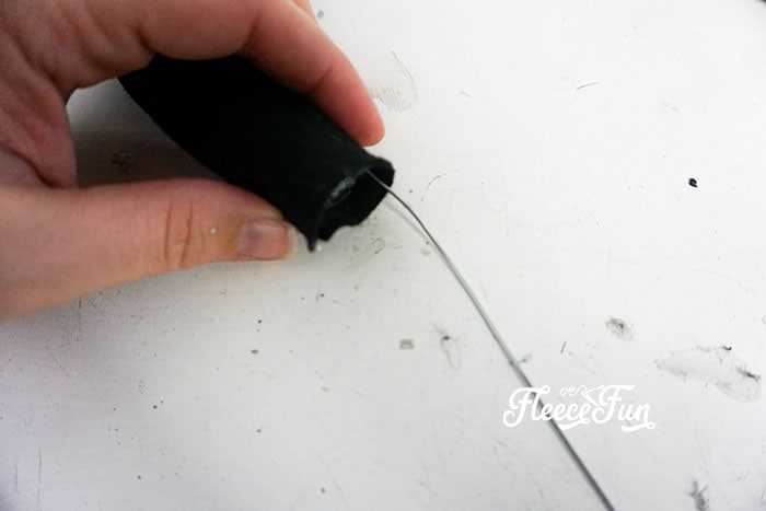Sliding a floral wire,