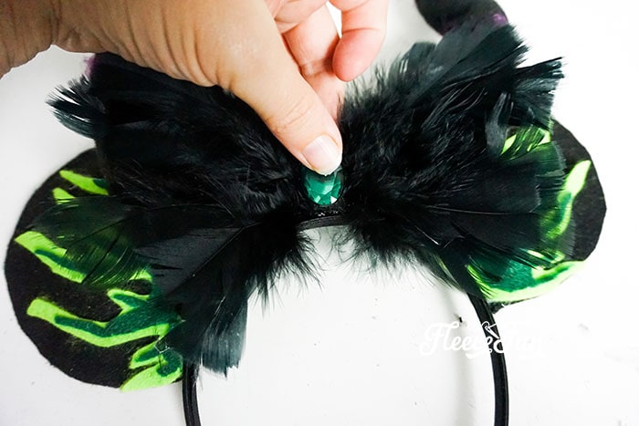 These Maleficent inspired Minnie Ears are perfect for chillin like a villain at your favorite Disney Park or a great idea for Mickey's Not So Scary Halloween Party. The free printable template makes it easy to put together.