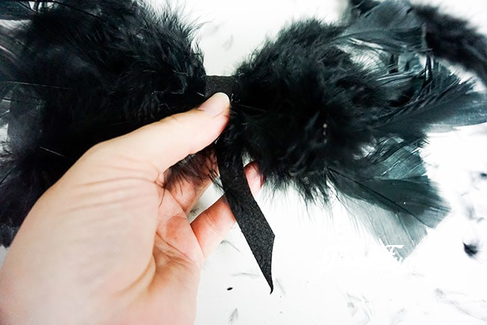 Wrapping the black craft felt.
