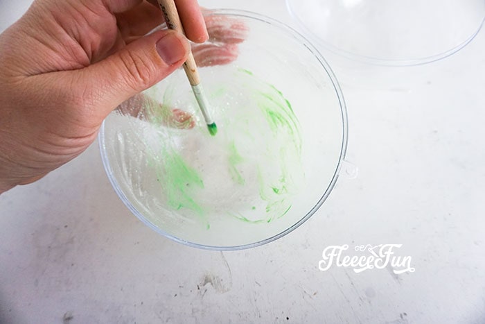 Dry brushing on green when glue becomes tacky.