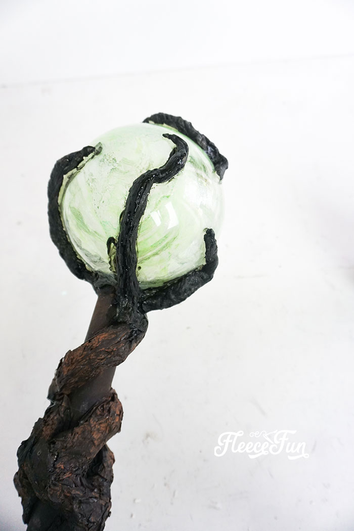 This Glowing Maleficent Staff DIY is perfect for the "Mistress of All Evil". With clear step by step instructions you'll love this addition to your costume.