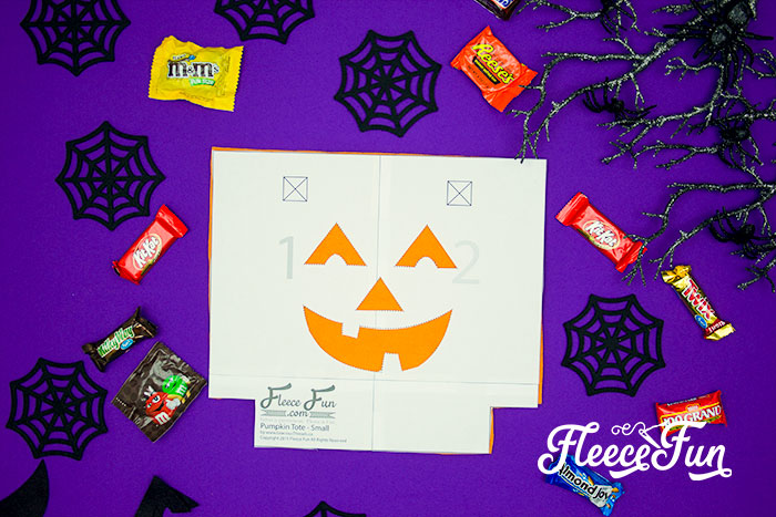 Adding a Jack O'Lantern face to your DIY Halloween bag with fleecefun's free template