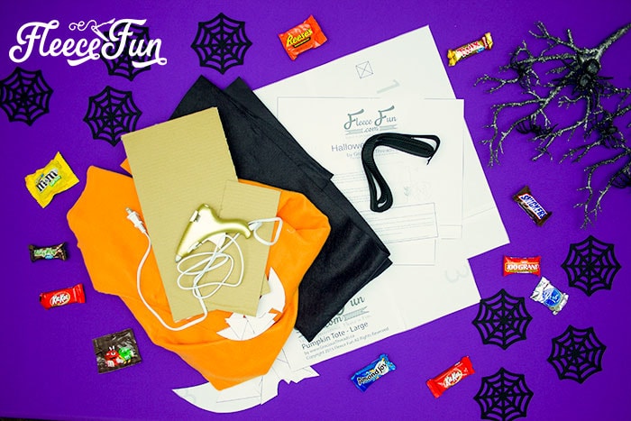 Cutting fabric for a DIY Halloween trick or treat bag with fleecefun free template