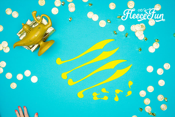 DIY Aladdin Magic Carpet costume fabric pieces prepped with fleecefun free pattern.