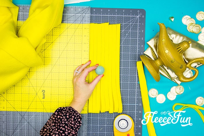 Making tassels for the Magic Carpet costume using fleecefun free template.