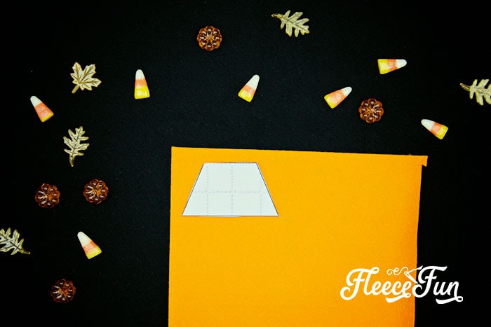 cutting out the candy corn shapes